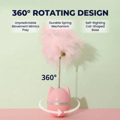 Pink cat toy with 360° rotating feather wand, self-righting base, and spring mechanism for playful cats