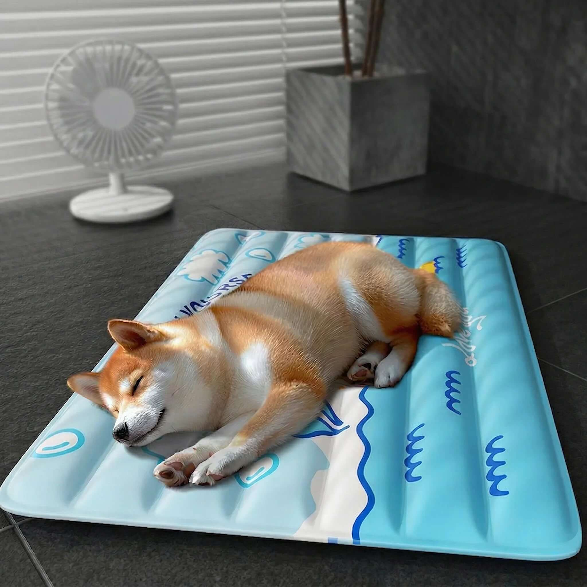 Summer Self-Cooling Gel Pad & Cooling mat for Dogs & Cats with a sleeping dog on it.