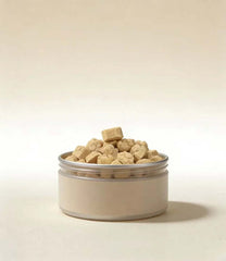 PawDry Freeze-Dried Goat Milk - Paw Shape Treats (100g) in a container, nutrient-dense cat snacks.