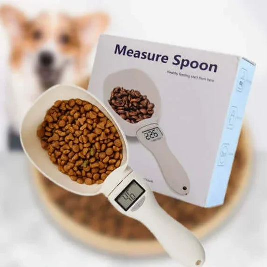 Digital measure spoon for dog food with LCD display, shown with kibble and packaging