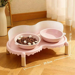 Pink elevated pet feeder with two bowls for cat or dog food and water, stylish design on wooden floor