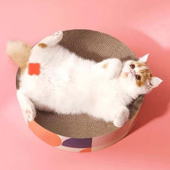 Petshy Cat Scratcher Board XL with a cat lounging comfortably on the durable corrugated surface.