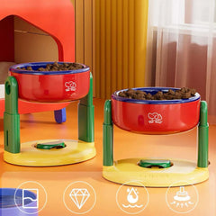 Elevated red pet bowls with green stands, filled with dry food, for cats and dogs