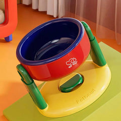 Red and blue elevated pet bowl with green legs on yellow base, ideal for dogs and cats