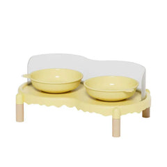 Yellow elevated pet feeder with two bowls and wooden legs for cats or dogs