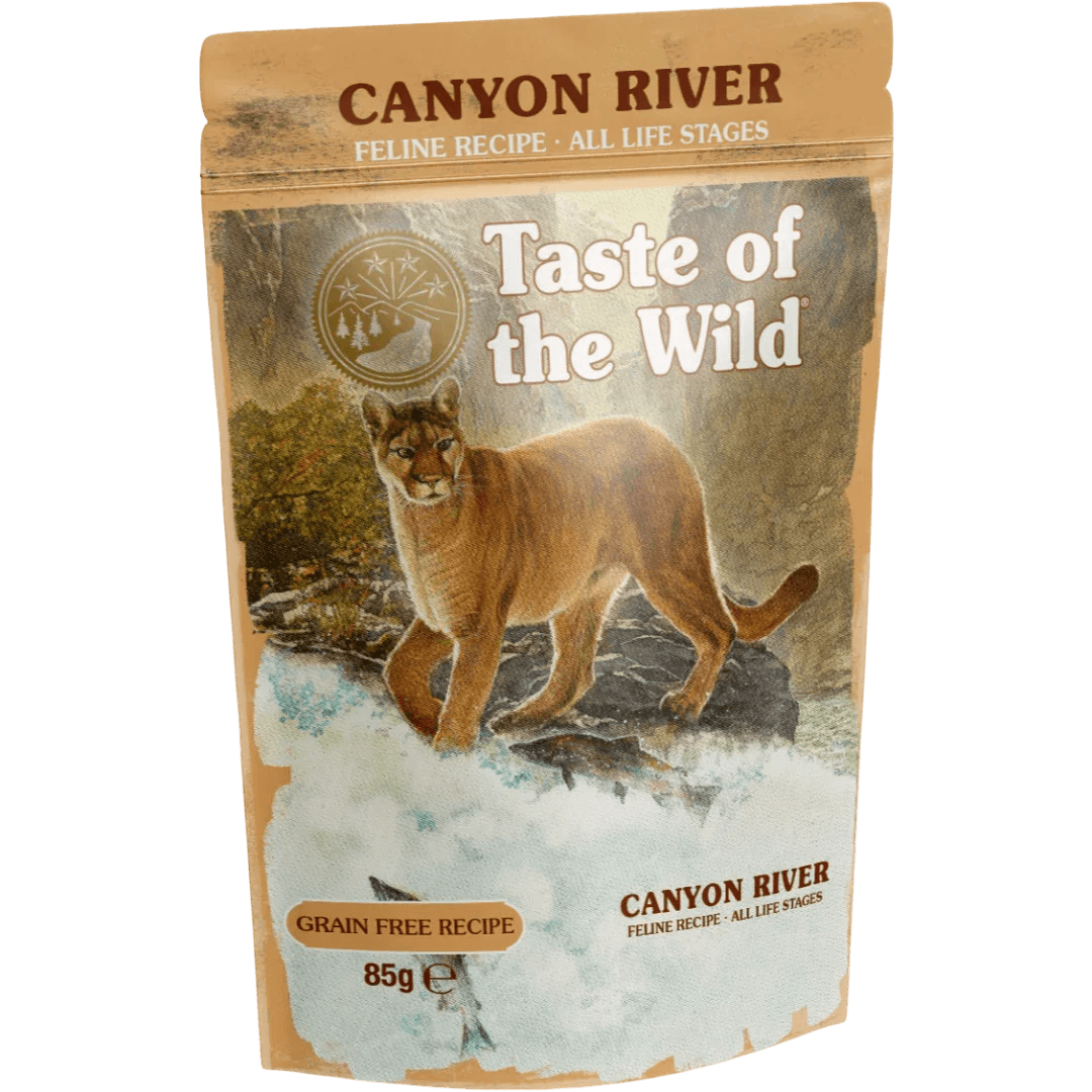 Taste of the Wild Grain-Free Canyon River Feline Recipe - Chunks in Gravy 85g x 12 Pack packaging with cat on it.