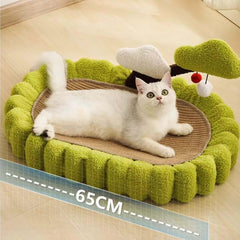 White cat lounging on green cloud-shaped cat bed with scratcher, 65cm, pet supplies for cats