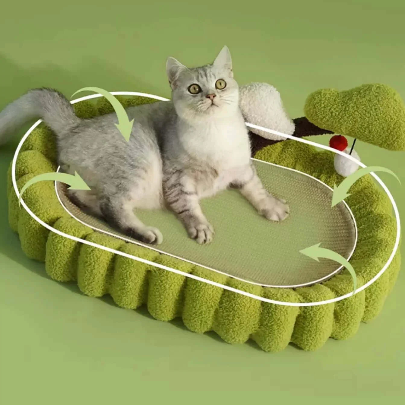 Grey cat lounging on green textured cat bed with plush sides and interactive toy, ideal for cozy pet comfort.