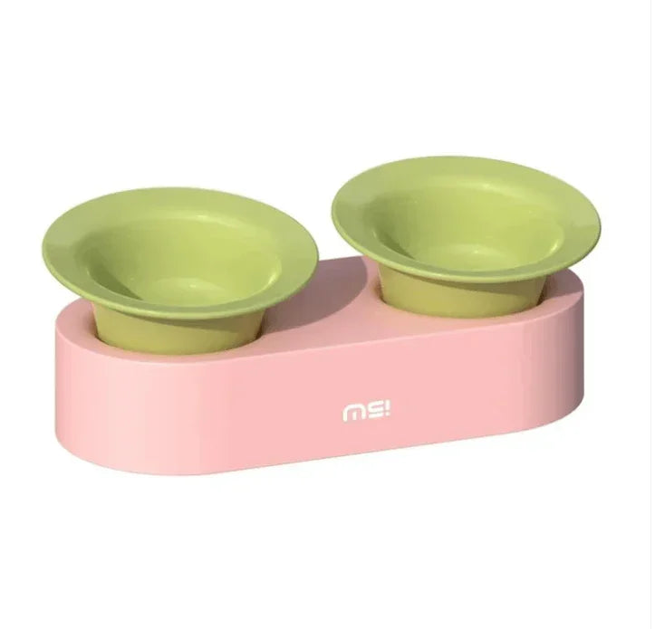 Pink elevated pet feeder with two green bowls for cats or dogs, stylish and practical design