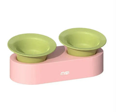 Pink elevated pet feeder with two green bowls for cats or dogs, stylish and practical design