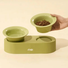 Sage green elevated pet bowl set with food and water dishes, ideal for cats and dogs