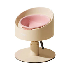 Modern elevated pet bowl with pink ceramic insert, stylish design for cats and dogs
