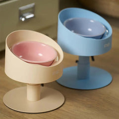 Stylish elevated pet bowls in pink and blue, modern design for cats and dogs