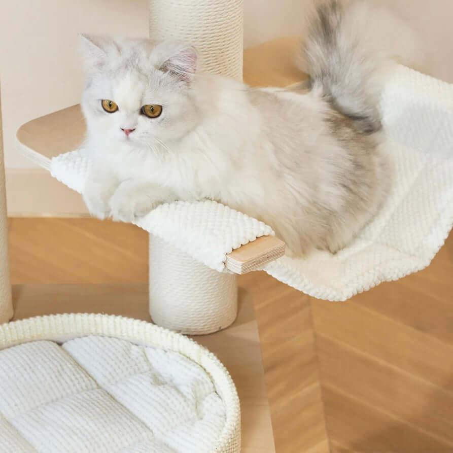 Michu Luna Multi-Layer Solid Wood Cat Nest Tree with a fluffy cat lounging on a cozy platform.