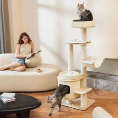 Michu Luna Multi-Layer Solid Wood Cat Nest Tree with two cats and a woman reading in a modern living room.