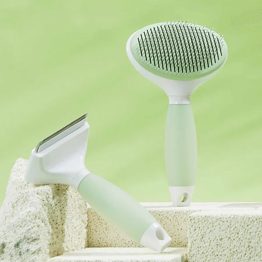 Michu Round-Head Grooming Dog/Cat Brush & Shedding Rake Bundle on a light green background.