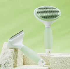 Michu Round-Head Grooming Dog/Cat Brush & Shedding Rake Bundle on a light green background.