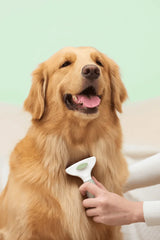 Michu Undercoat Grooming Tool Shedding Rake being used on a happy golden retriever.