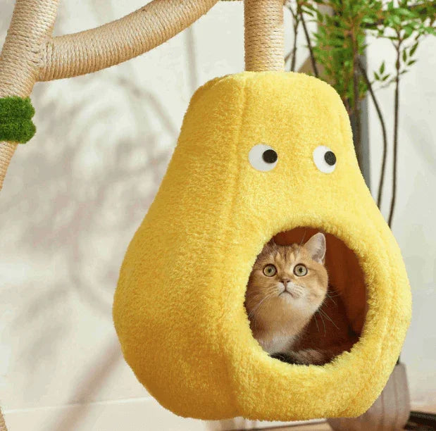 Cat resting inside the yellow Michu Verde Solid Wooded Base Cat Tree hammock, featuring a playful design.