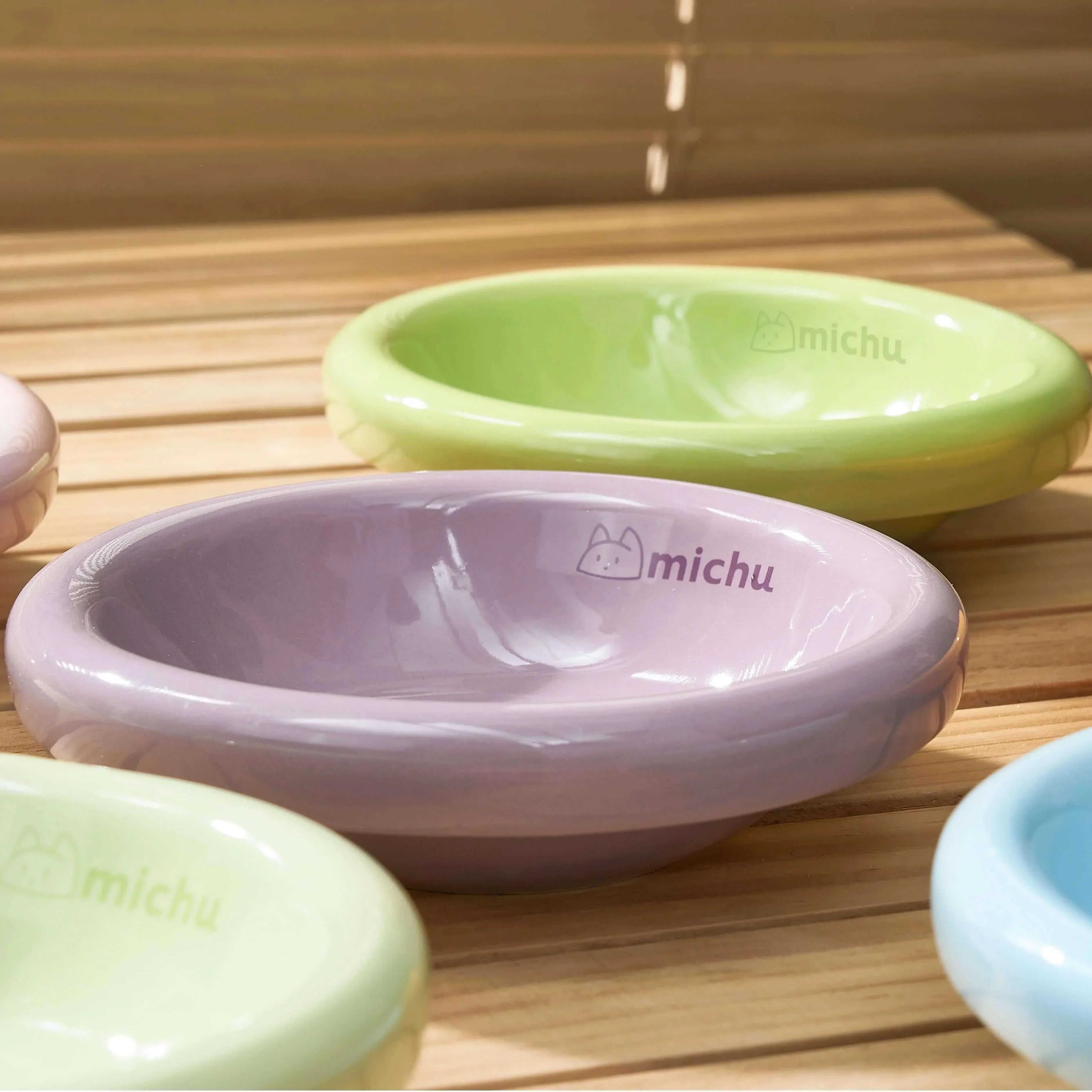 Pastel cat bowls with Michu logo, stylish pet feeding dishes for cats