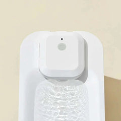 Michu Wireless Cat Water Fountain - Battery Operated Dispenser for Healthy Hydration top view showing sleek design and water source.