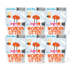 Six packs of Michu Wonder Litter, plant-based cat litter with guar, corn & tapioca, ideal for cats and dogs.
