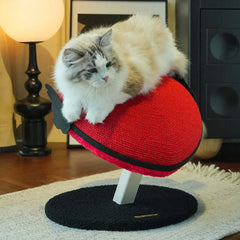 Vertical Heart-Shaped Cat Scratchers with Wings – Durable Natural Sisal Stretching Post with a fluffy cat on top.