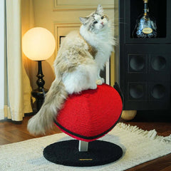 Vertical Heart-Shaped Cat Scratchers with Wings – Durable Natural Sisal Stretching Post with a cat on top.