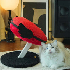 Vertical Heart-Shaped Cat Scratchers with Wings – Durable Natural Sisal Stretching Post with a fluffy cat nearby.