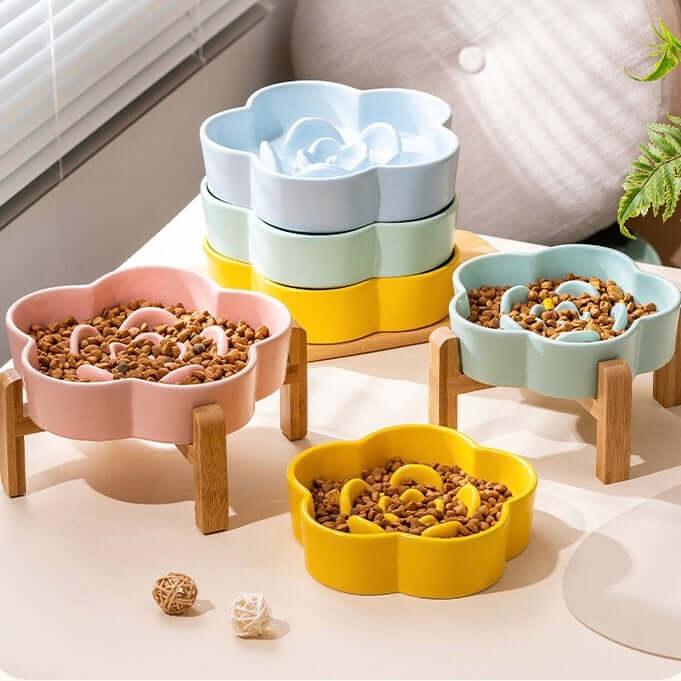 Flower-shaped elevated pet bowls in pastel colors with slow feeder design for cats and dogs