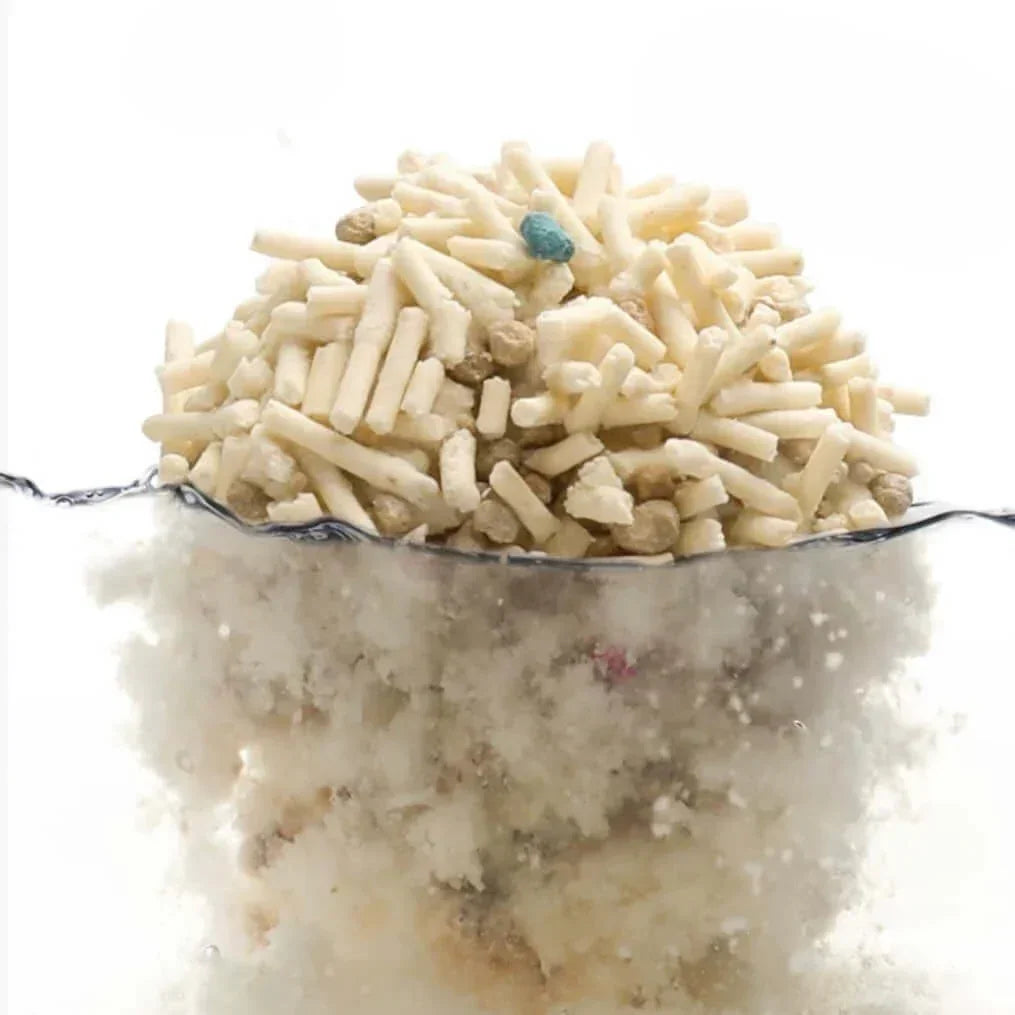 Cat litter pellets absorbing water, showing clumping and odor control for cats