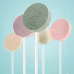 Colorful pet dental chews on sticks for dogs and cats, promoting oral health with tasty flavors.