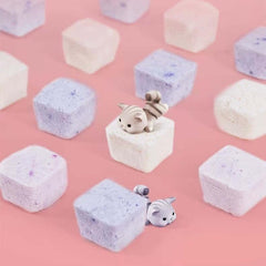 Adorable cat figurines on pastel bath bombs, perfect for pet lovers and spa gifts