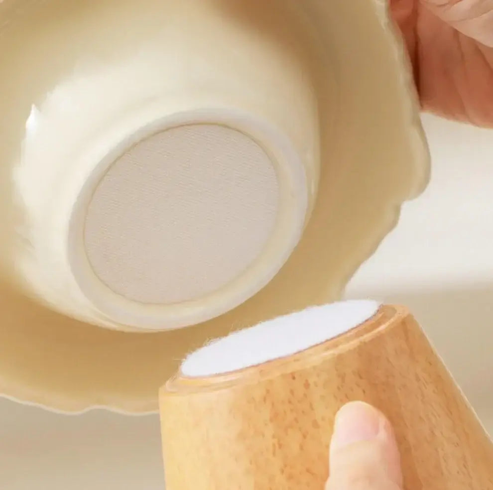 Pet bowl with non-slip silicone pad for cats and dogs, shown with wooden stand for stability
