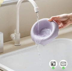 Purple pet bowl being filled with water under faucet, dishwasher and microwave safe
