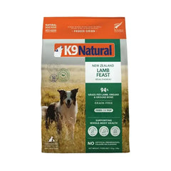 K9 Natural Grain Free Lamb Feast Freeze Dried Raw Dog Food 1.8KG packaging with dog and field backdrop.