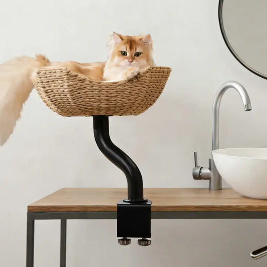Michu DeskMate Desk-Mounted Cat Tree Perfect For WFH with a cat lounging in a stylish basket perch.