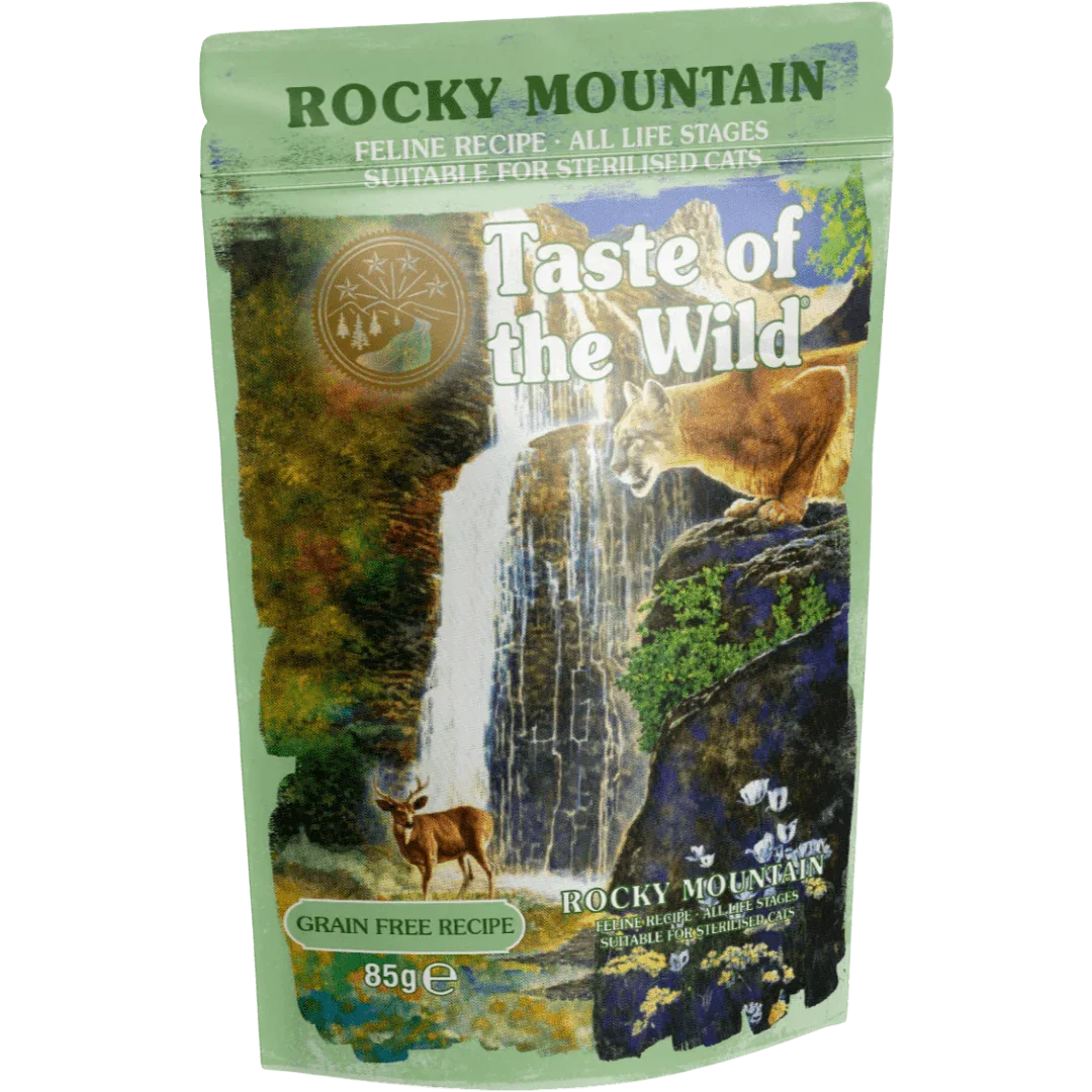 Taste of the Wild Grain-Free Rocky Mountain Feline Recipe - Chunks in Gravy 85g x 12 Pack, wet cat food pouch in natural setting.