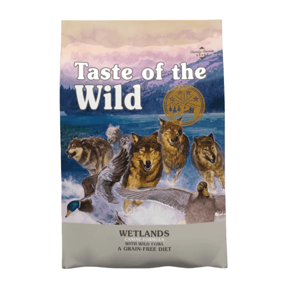 Taste of the Wild Wetlands Canine Grain-Free Dry Dog Food 12.2kg packaging featuring wolves and scenic wetlands.