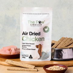 THE PAW GROCER Air-Dried Chicken Dog Training Straps 100g product packaging with chicken and training treats