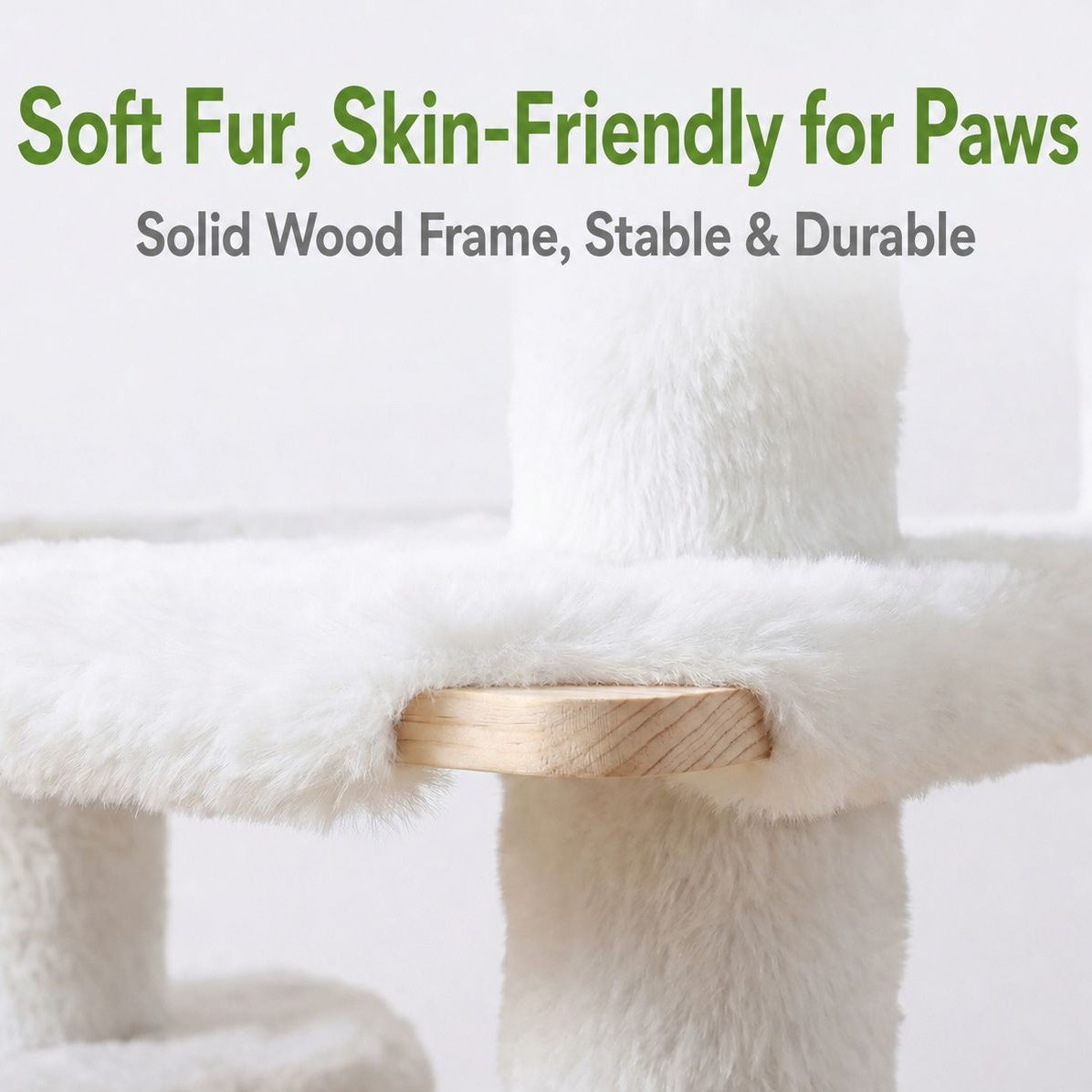 Close-up of a white plush cat tree with a light natural wood perch and posts, with text reading 'Soft Fur, Skin-Friendly for Paws' and 'Solid Wood Frame, Stable & Durable'.