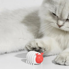 Michu MeowMate Little Monster Automatic Cat Toy with red and white design next to a cat paw.