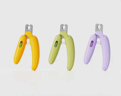 Colorful pet nail clippers for cats and dogs in yellow, green, and purple designs