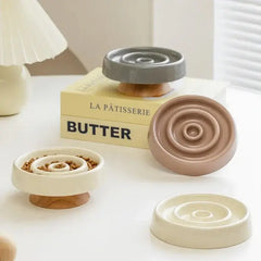 Stylish ceramic slow feeder bowls for dogs and cats with wooden bases, ideal for mindful pet feeding