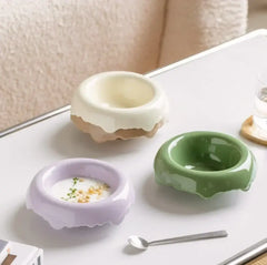 Stylish ceramic pet bowls in pastel colors for cats and dogs, modern design with scalloped edges