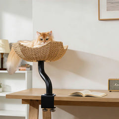 Michu DeskMate Desk-Mounted Cat Tree Perfect For WFH with a cat lounging comfortably on a woven perch above a desk.