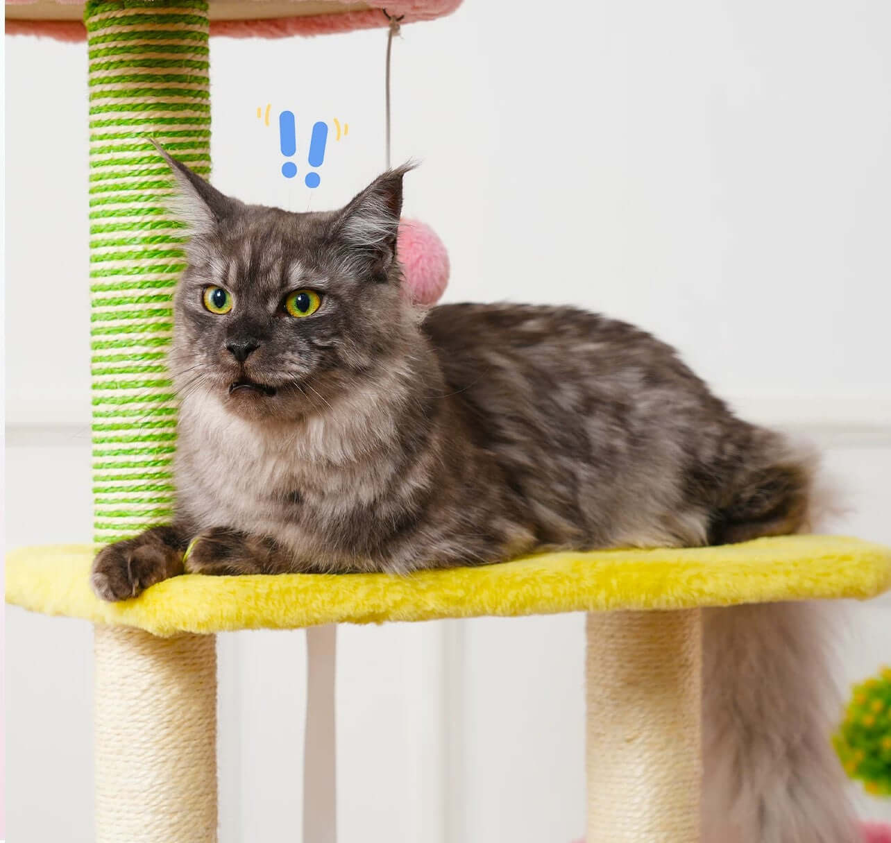 Multi-Level Cat Tree Tower with Hammock and Sisal Posts 136cm, a cat lounging on a platform with sisal posts.