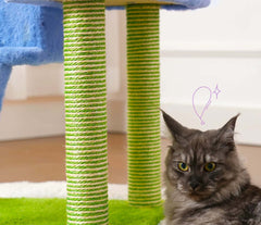 Multi-Level Cat Tree Tower with Hammock and Sisal Posts 136cm featuring green sisal posts and a curious cat.